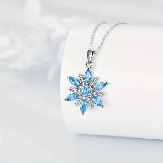 Model wearing Snowflake Pendant Necklace, side view highlighting design