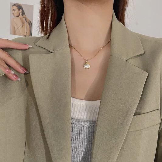 Model wearing Starfish & Seashell Pendant Necklace