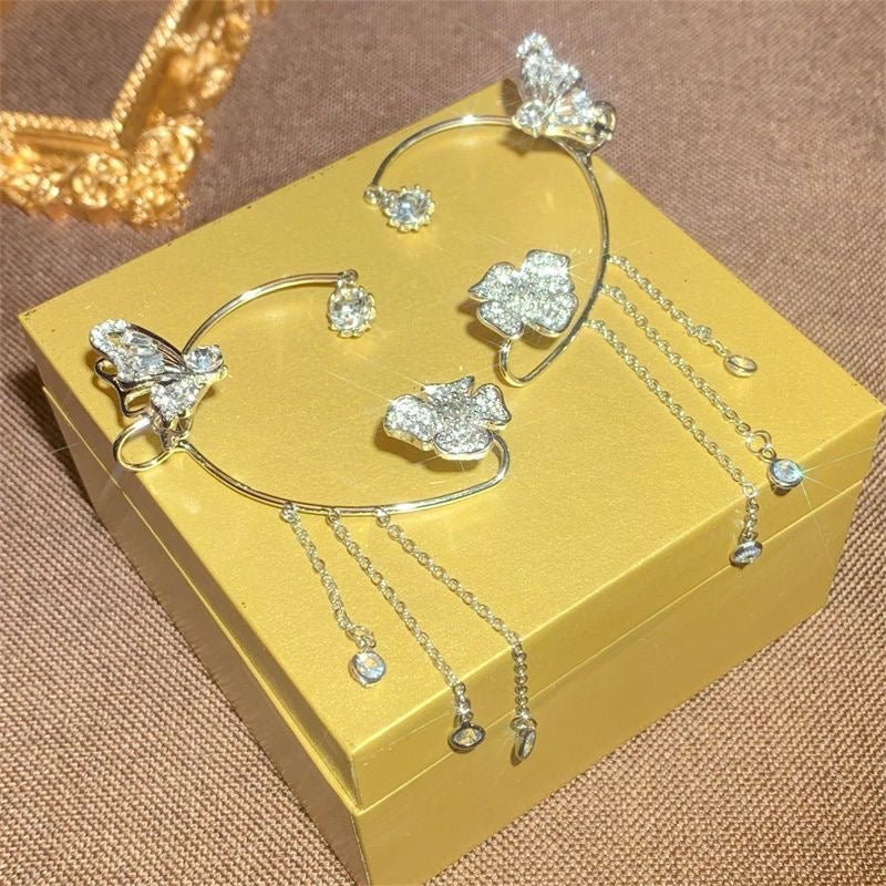Silver Graceful Butterfly Ear Cuffs featuring celestial star and moon details