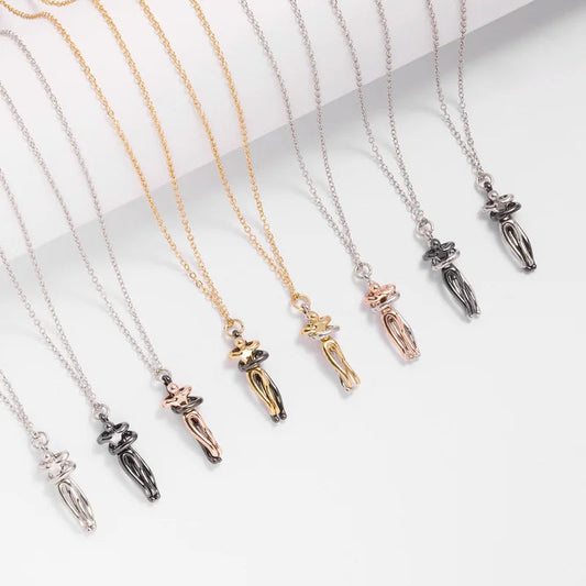 Handcrafted human figure-inspired pendant by CotaJewelry