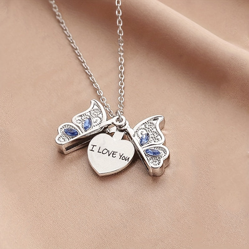 Close-up of I Love You engraved butterfly pendant