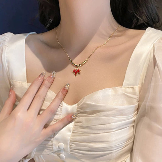 Lifestyle image of Maple Leaf Necklace paired with fall fashion