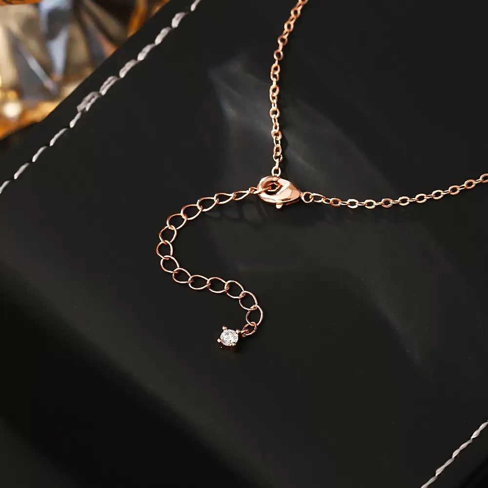 Delicate pink four-leaf clover pendant necklace