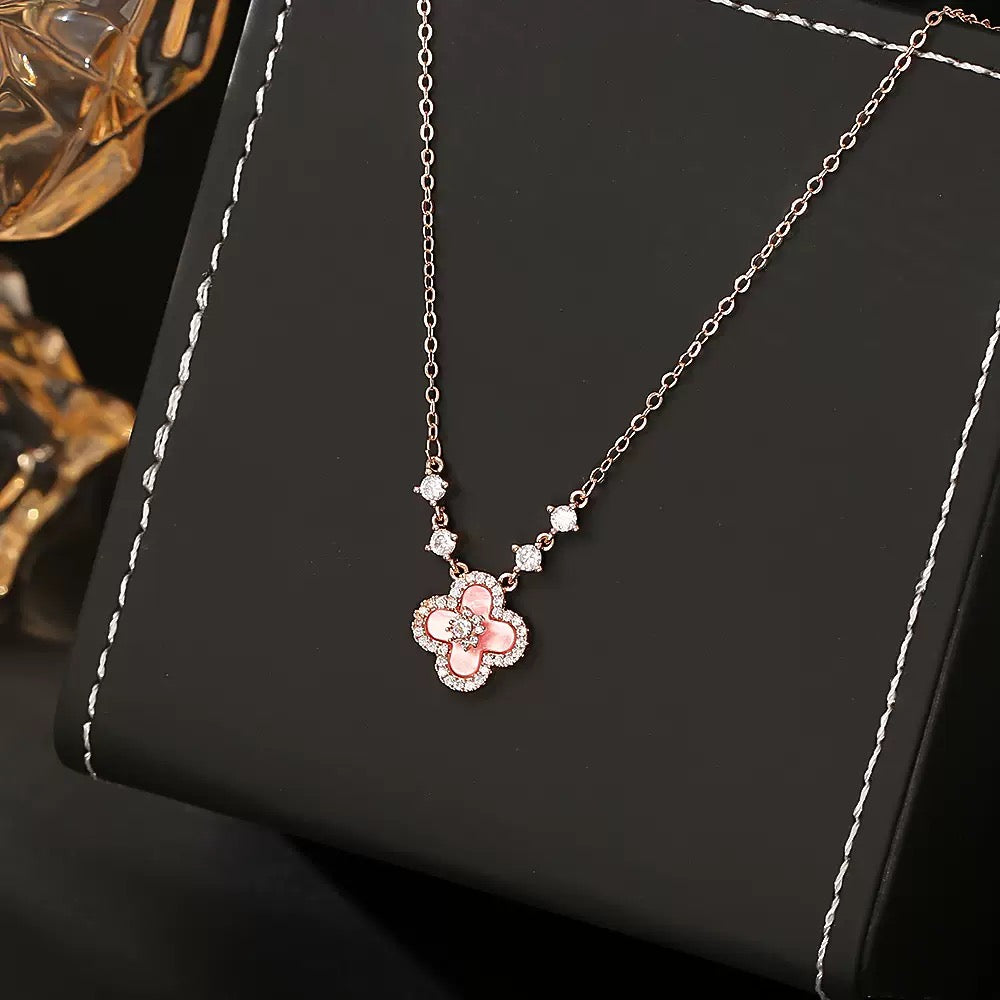 Pink four-leaf clover necklace with diamond-cut cubic zirconia