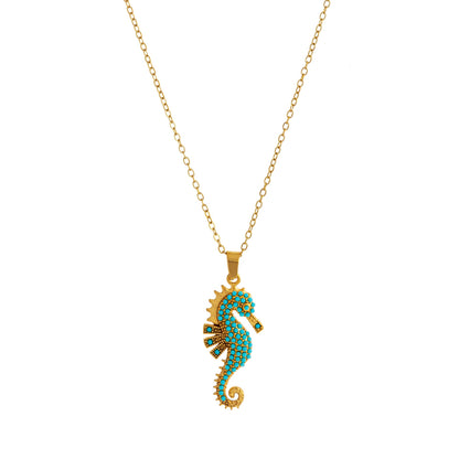 Model styling Sea Horse Necklace with casual chic look