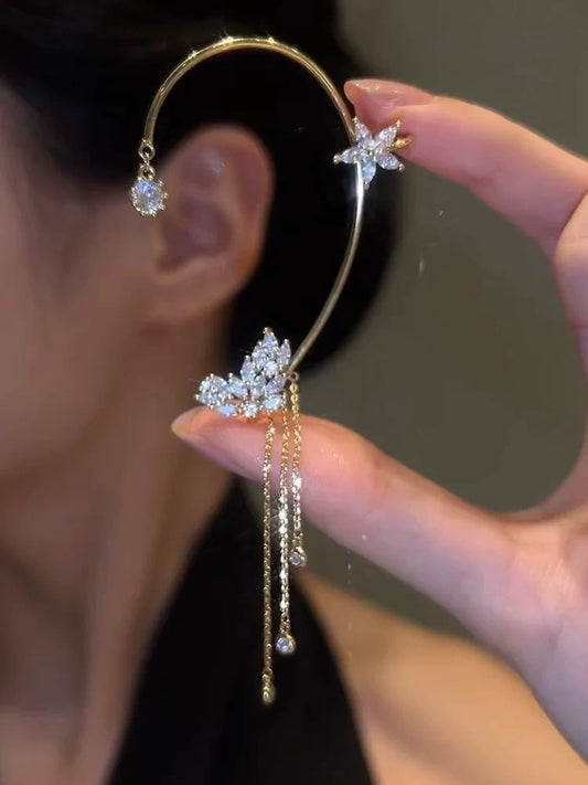 Close-up of butterfly ear cuff showcasing intricate detailing