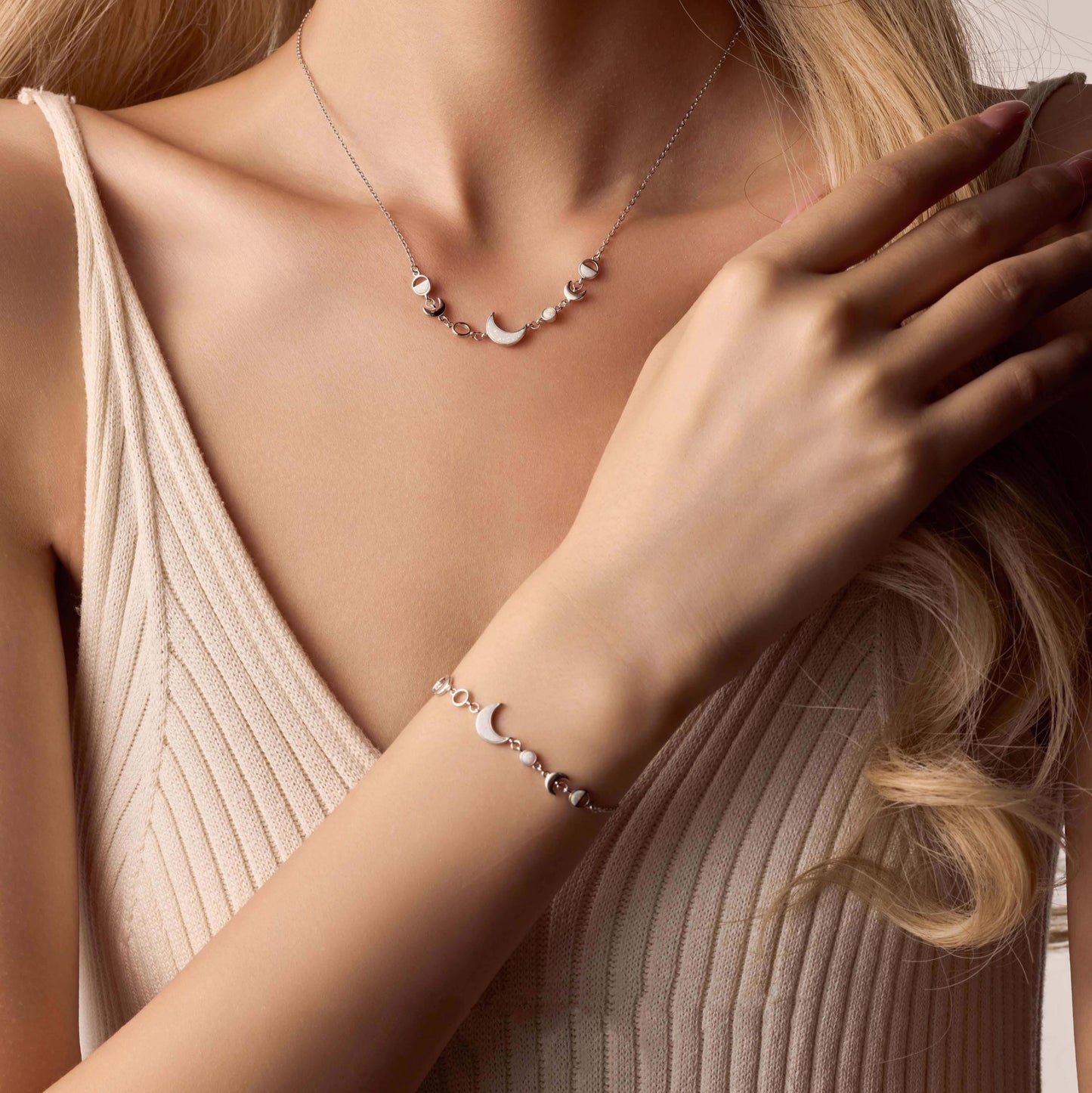 Women wearing Moon Phases Bracelet with elegant celestial design